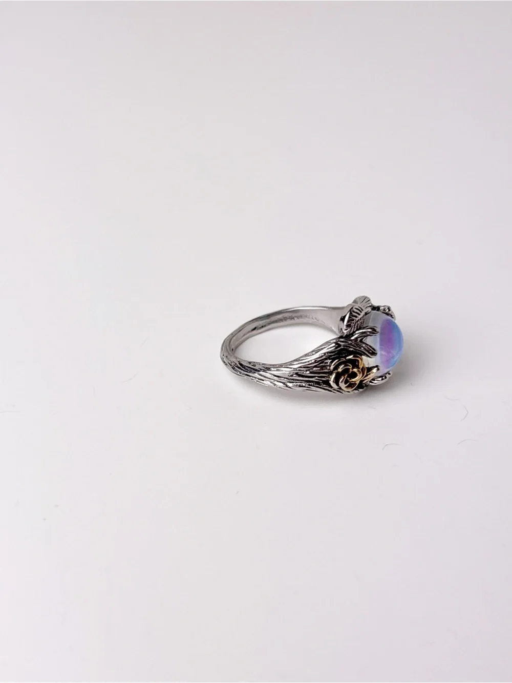 Sterling Silver Flower and Leaf Motif Moonstone Ring in Iridescent Blue